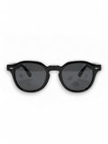 Aurélio Eyewear C9 zonnebril met glanzend zwart montuur en grijze gradiënt glazen in een klassiek rond design