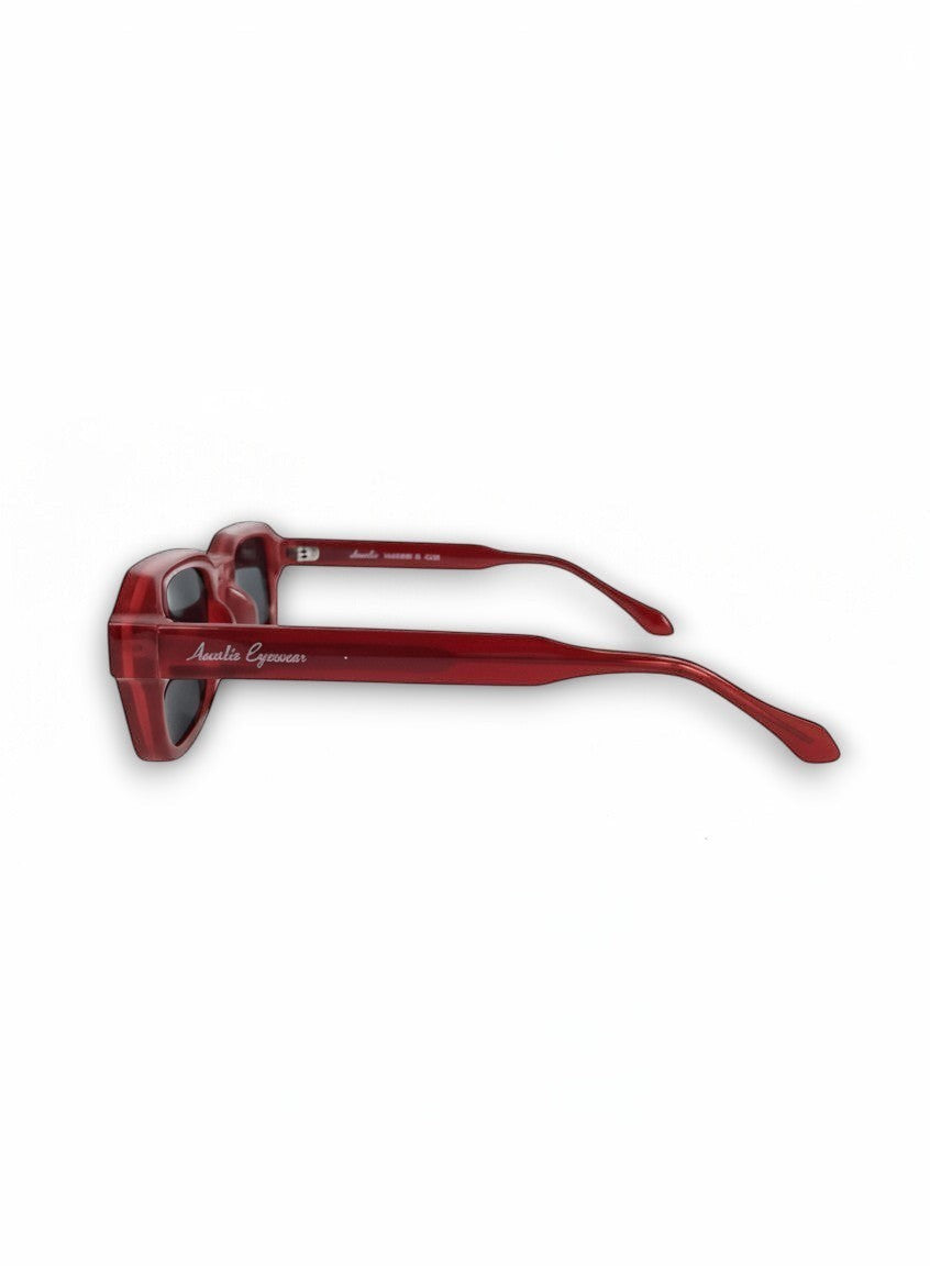 Aurélio Eyewear zonnebril met glanzend rood montuur en donkere glazen, zijaanzicht